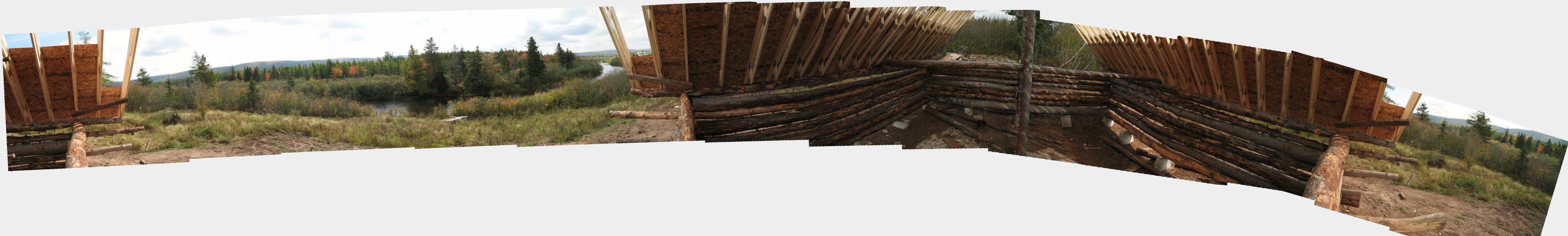 panoramic view of cabin and river